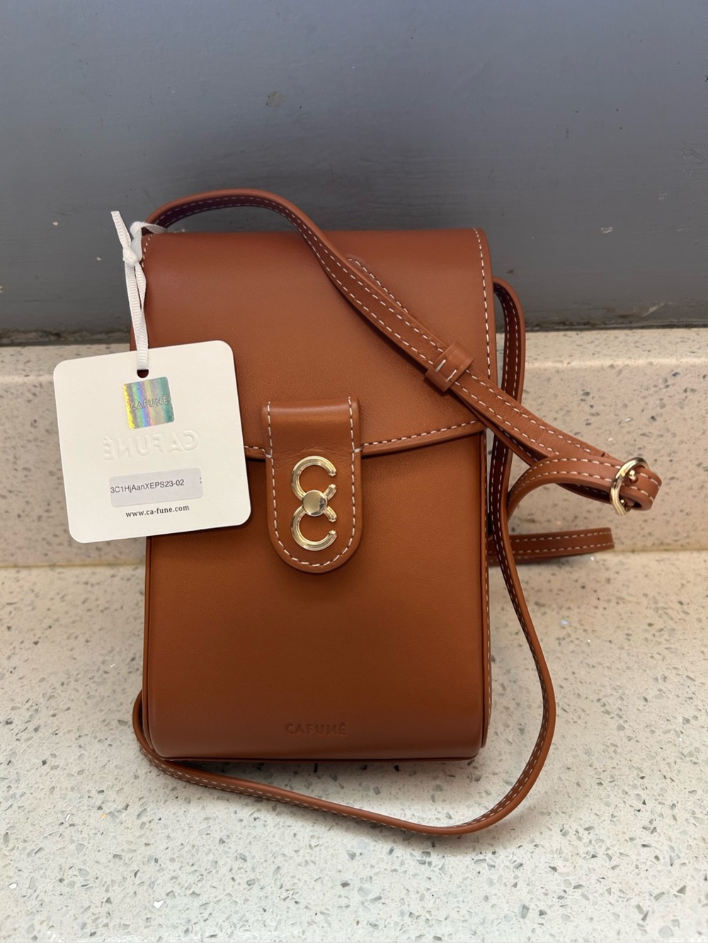 Cafune brown leather cross body bag